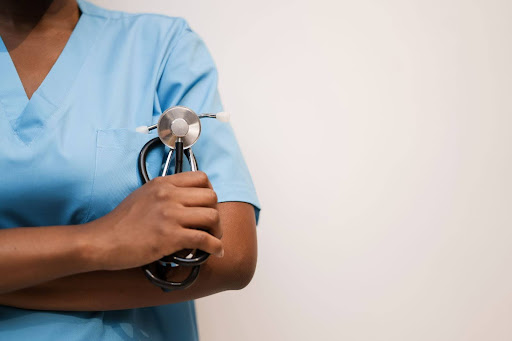 Healthcare specialist with a stethoscope in her hand