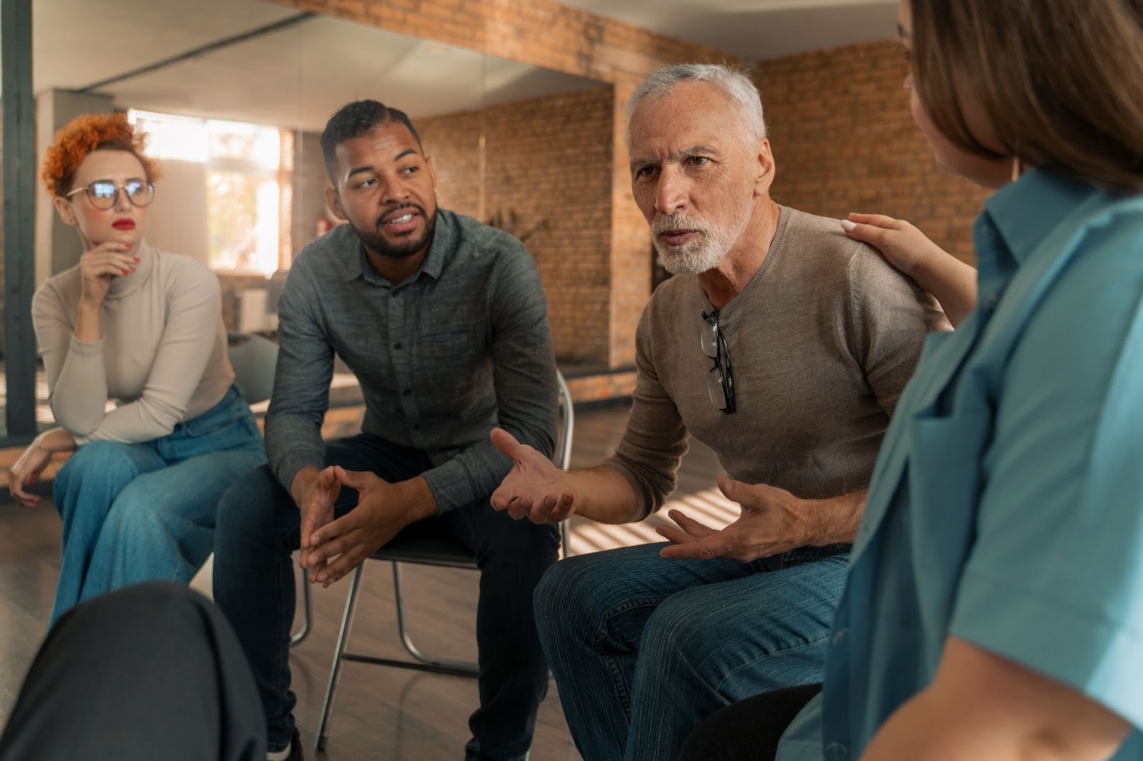 Group speech therapy for adults with diverse participants sharing experiences and support