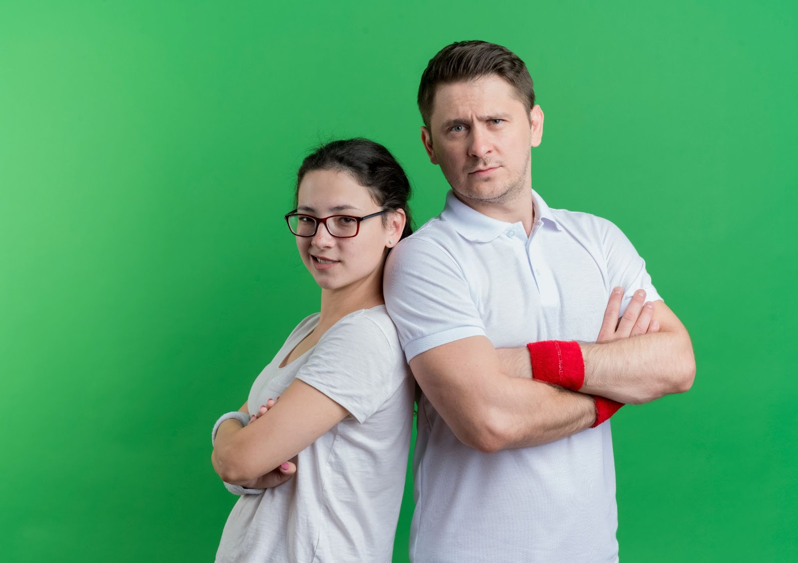Physiotherapist and occupational therapist standing back-to-back, representing OT vs physio comparison