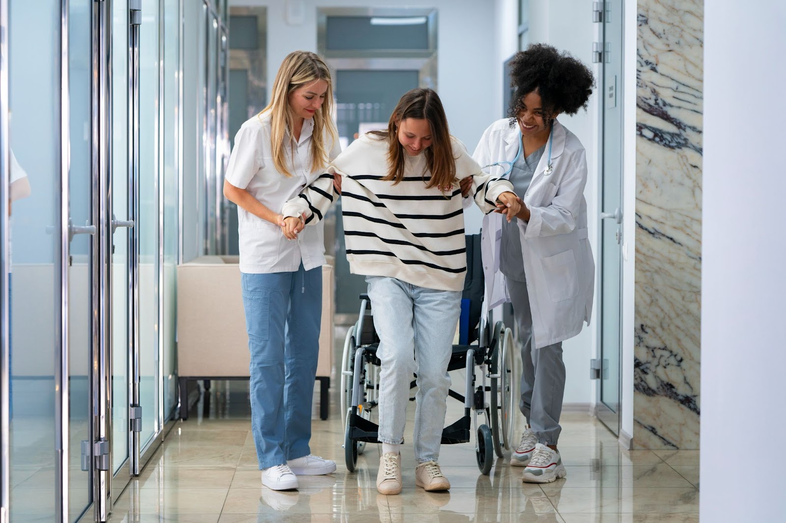 NDIS nursing professionals aiding a patient’s rehabilitation in a disability care environment